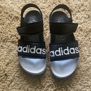 Black and white adidas sandles